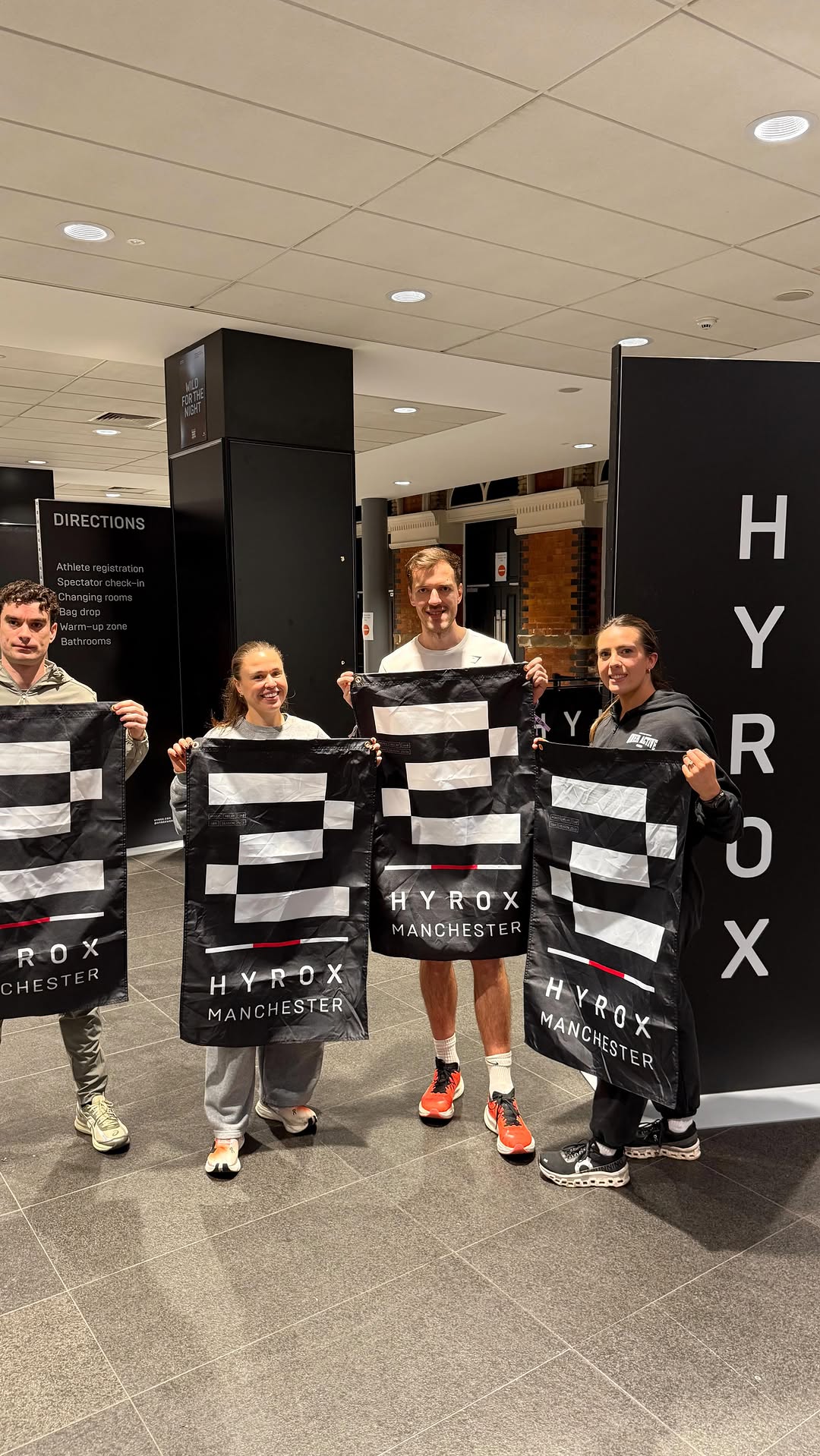 HYROX athletes with race flags